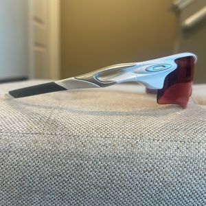 Oakley Radar Lock sunglasses with white frames and Prizm iridescent lenses